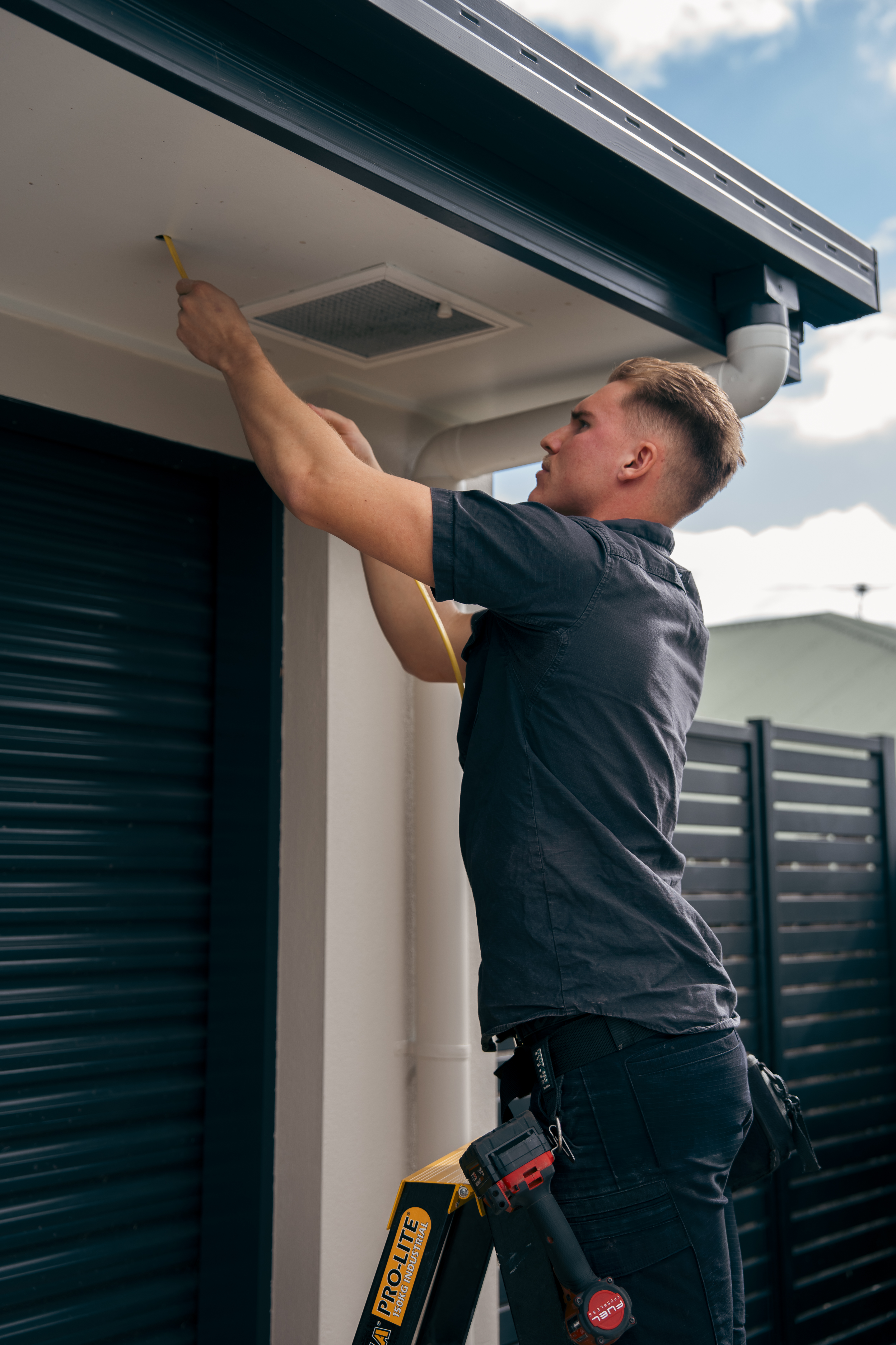 Electrician working on exterior